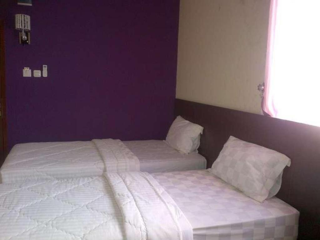 Erin Int Hotel Makassar Buitenkant foto
